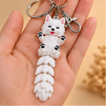 WHITE ARTICULATED DOG KEYCHAIN