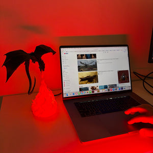 3D printed GOT dragon lamp displayed on a gaming desk setup